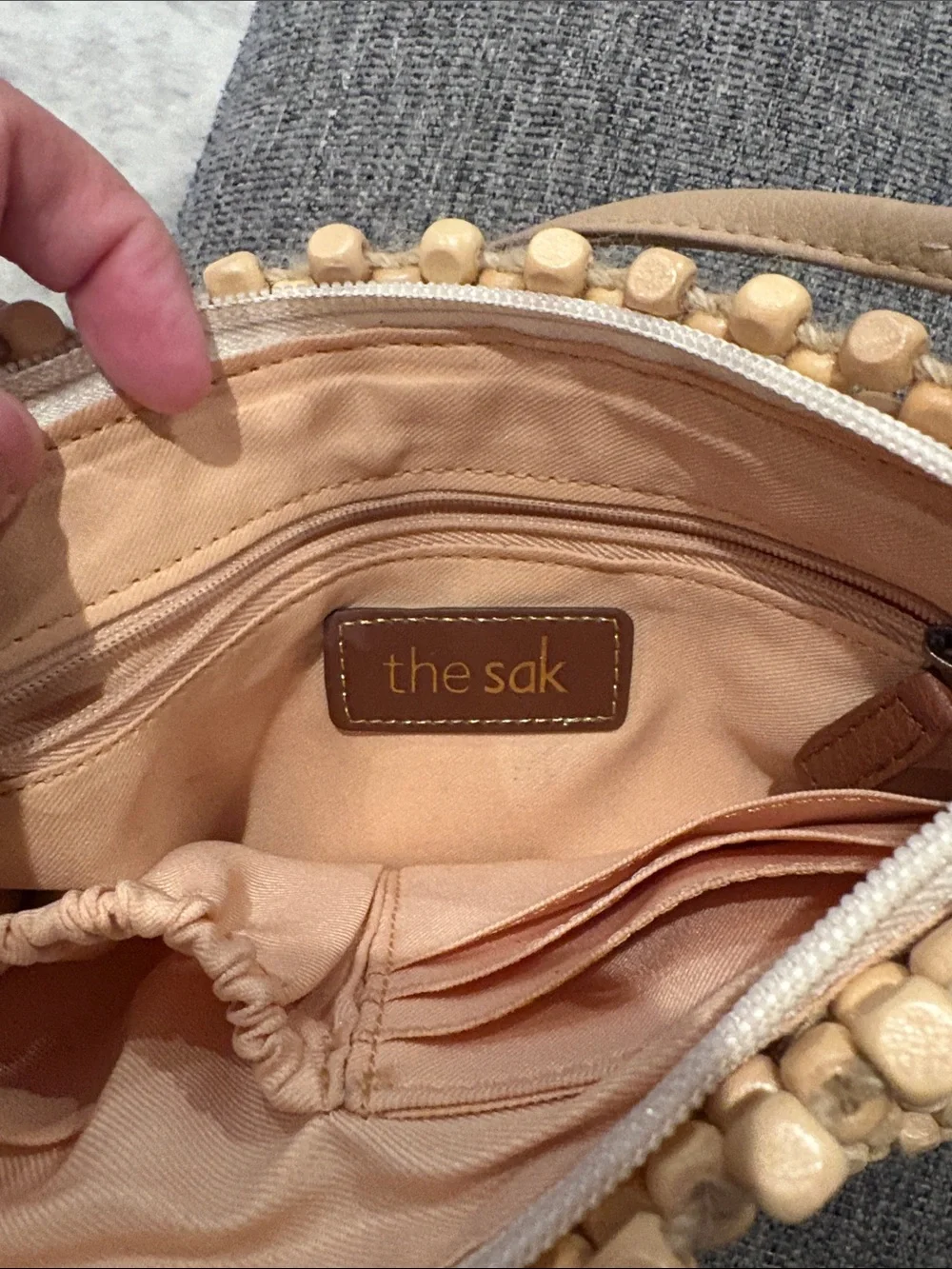The Sak Handwoven Beaded Wristlet in Beige